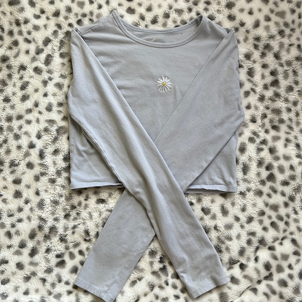 A light blue crop top with long sleeves from Hollister size medium.
